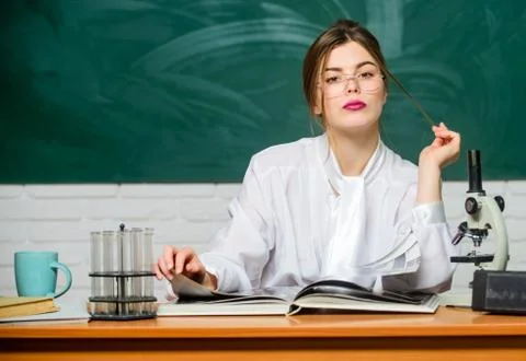 Chemist biologist with microscope. Smart student. Study hard. Education concept Stock Photos