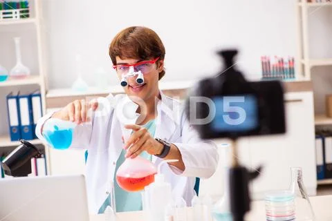 Chemist blogger recording video for his blog Stock Photos