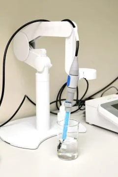 A chemist conducts a study of the stiffness of the solution. Laboratory PH Stock Photos