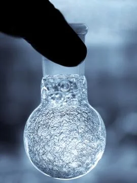 Chemist holding flask 스톡 사진