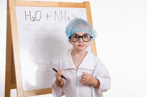 Chemist with a marker at the blackboard Stock-Fotos