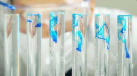 Chemist Mixing Liquids Beaker Test Tube Chemical Reaction Stock Footage 51558524