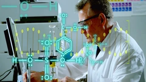 Chemist positioning pipette and initiating transfer for lab analysis with Stockbeeldmateriaal 333873265