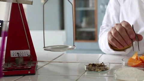 Chemist, put the ingredients in balance Stock Footage 71933589