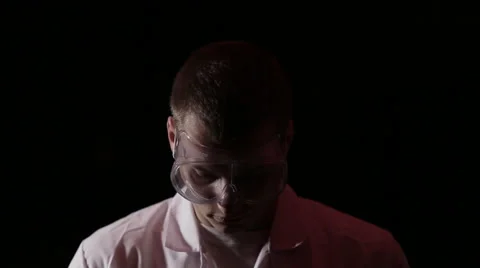 Chemist raises its head Stock Footage 48055117