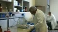 chemist weighing chemical compound HD Footage