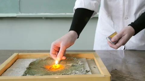 Chemistry demonstration using fire. Student gets experience in chemistry Stock Footage 95744163