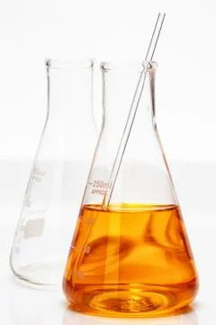 Chemistry flask on white Stock Photos