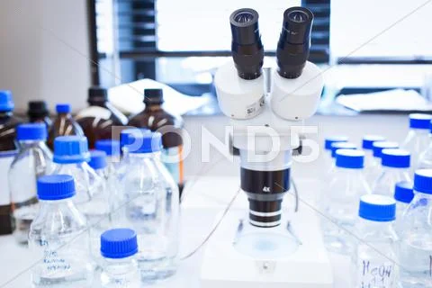 Chemistry lab (shallow DOF; focus on the beakers in the foregrou Stock Photos