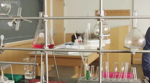 Chemistry Teacher at Microscope HD Vídeos de archivo 61246387