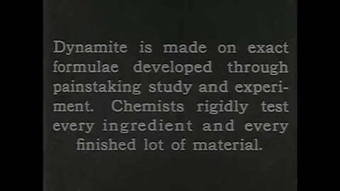 Chemists work in a lab on a dynamite plant in the 1920s. Stock Footage 139643034