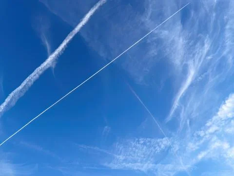 Chemtrail Patterns on Blue Sky Stock Photos