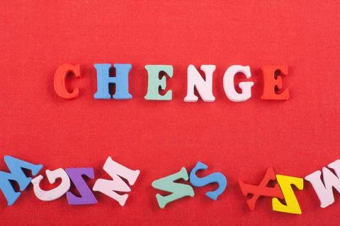 CHENGE word on red background composed from colorful abc alphabet block woo.. Stock Photos