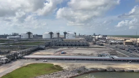 CHENIERE logo and LPG storage facility on the background, USA, May 03, 2025 Stock Footage 308232095