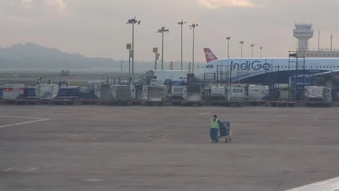 Chennai, India- 2024, Oct 10: Airport View with Multiple Planes and Crew at Work Stock Footage 304079593
