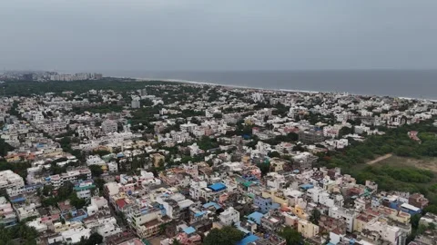 Chennai’s sandy beachfronts and crowds at Elliots Beach aerial shot Stock Footage 315759326