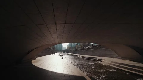 Cheonggyecheon Stream Under Bridge With Light Reflection in Seoul 스톡 동영상 333872665