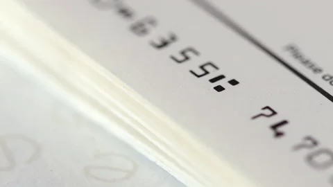 Cheque book extreme close up HD stock footage Vídeos de archivo 81913183