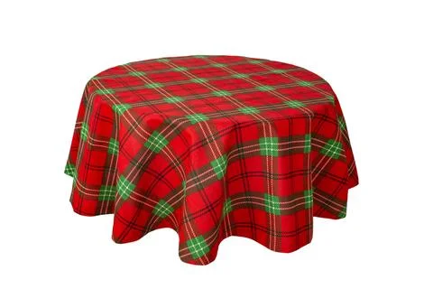 Chequered pattern tablecloth on a round table, side view isolated on white,.. Foto stock