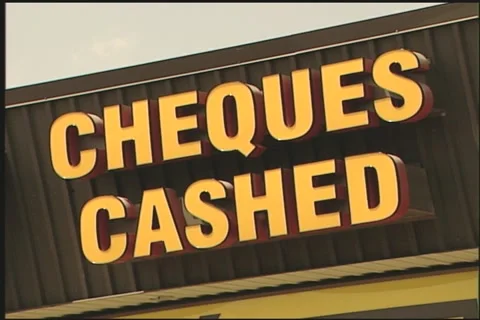 "Cheques Cashed" sign Stock Footage 981299