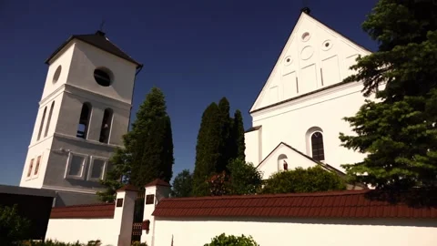 CHERNAVCHITSY, BELARUS - JUNE 11 2022: Catholic Church of Holy Trinity. Belar Stock Footage 212946119