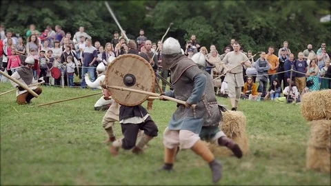 CHERNIVTSI, UKRAINE - JUNE 18, 2017: Fights on swords - war of Vikings Stock Footage