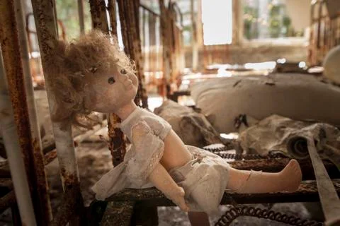 Chernobyl - Doll on rusty bed base Stock Photos