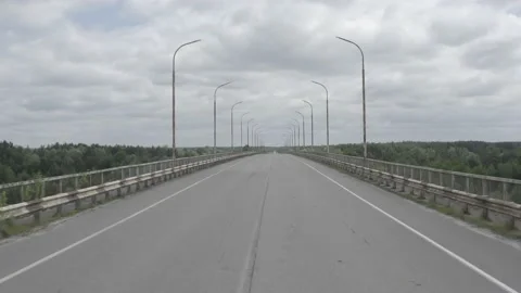 Chernobyl Exclusion Zone. Bridge leading to Prypiat. Aerial. Summer Vídeos de archivo 157155129