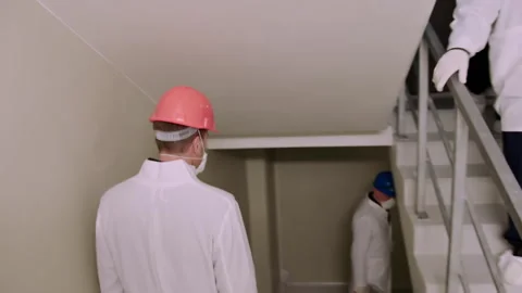 Chernobyl exclusion zone nuclear plant worker descending stairs Stock-Footage 332829337