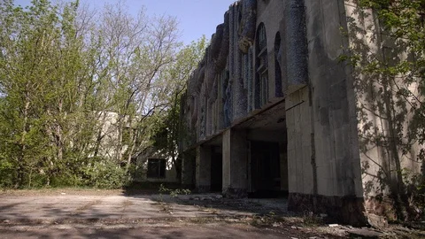 Chernobyl Exclusion Zone. Post Office building in Pripyat. Wide Dolly Shot Stock Footage 128664122