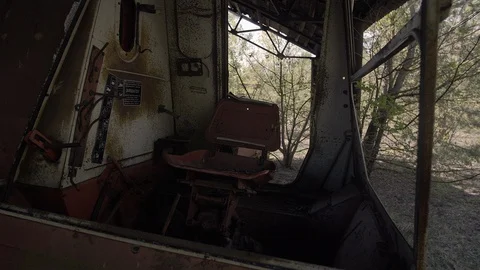 Chernobyl Exclusion Zone. Rusty Harvesters In An Abandoned Zymovyshche Kolkhoz Stock Footage 128667545