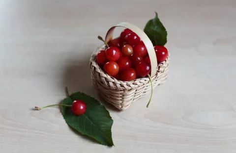 Cherries in a basket Stock Photos