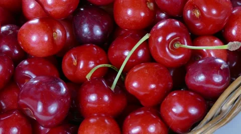 Cherries in basket rotating counter clockwise Stock Footage 64170509