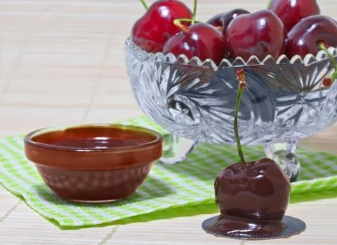 Cherries in chocolate Stock Photos