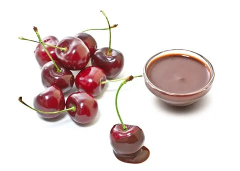 Cherries in chocolate on a white background Stock Photos