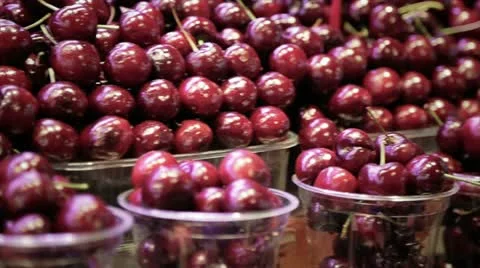 Cherries in cups at the market Stock Footage 20615906