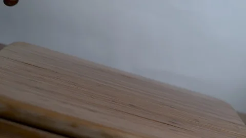 Cherries falling on chopping board in slow motion Stock Footage 100006468