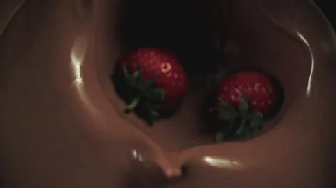Cherries Falling into Melted Chocolate Stock Footage 66730588