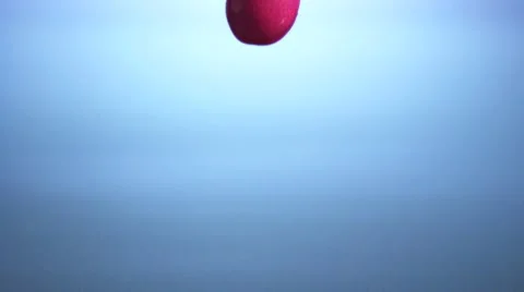 Cherries falling into water Video stock 8572555