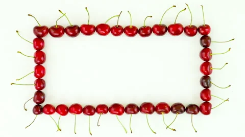Cherries frame on white background. Top view. stop motion animation, 4K Stock Footage 64557989
