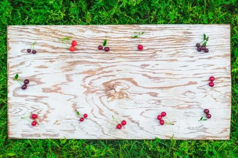 Cherries frame on white board Stock Photos