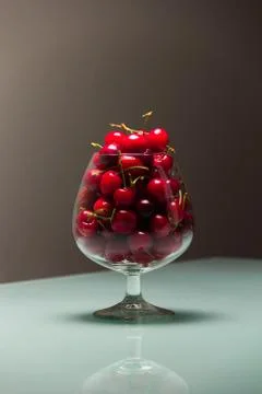 Cherries in the glass Stock Photos