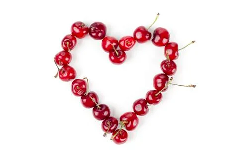 Cherries in heart shape Stock Photos