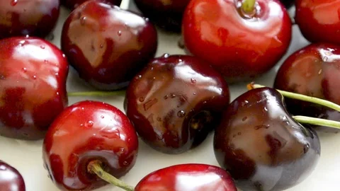 Cherries on a plate berry background Stock Footage 96888877