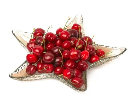Cherries on plate Stock Photos