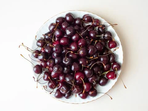 Cherries on a plate Stock Photos