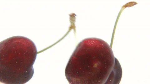 Cherries splash in the water Stock Footage 600154