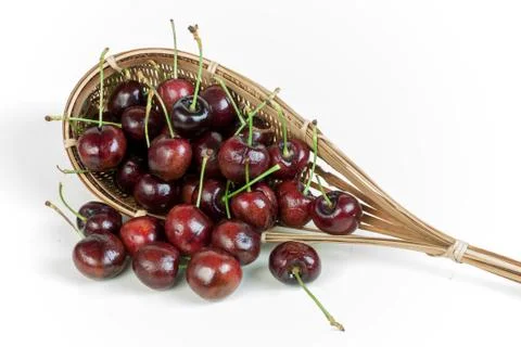 Cherries stack in fruit-picker Stock Photos