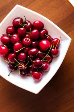 Cherries in a white square plate Stock Photos