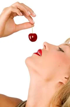 The cherry and lips Stock Photos